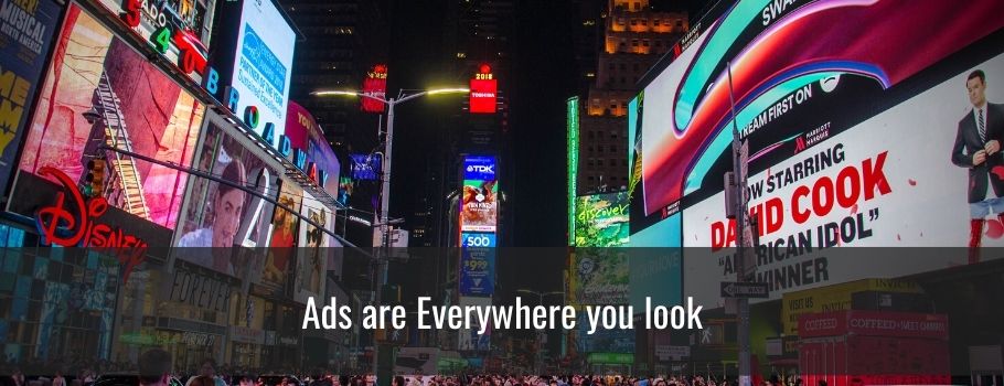 Ads are Everywhere you Look in this image except the sky